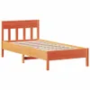 A wooden bed frame with a slatted base, shown from a side angle against a white background. Produktbild-Vorschau