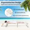 A woman lying on a beach lounger on a sandy beach with palm trees and the ocean in the background. Náhled obrázku produktu