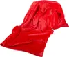 A red blanket is draped over an unseen surface, creating folds and shadows. Náhled obrázku produktu