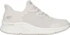 A side view of a beige Skechers sneaker. Produktbild-Vorschau