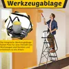 A man is painting a wall while standing on a ladder with a tool tray. Anteprima dell’immagine prodotto