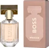 A perfume bottle and its packaging are displayed side-by-side against a white background. Anteprima dell’immagine prodotto