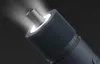 A close-up shot of the head of an electric screwdriver, with the light beam illuminated. Podgląd zdjęcia produktu