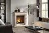 A living room scene with a fireplace, sofa, and coffee table. Anteprima dell’immagine prodotto