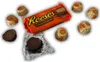 Reese's Peanut Butter Cups are arranged around a partially opened package. Náhled obrázku produktu