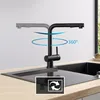 A black kitchen faucet is shown in a sink, with graphics indicating its 360-degree rotation capability. Produktbild-Vorschau