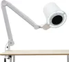 A white adjustable arm lamp with an LED ring light is clamped to a light-colored desk. Podgląd zdjęcia produktu
