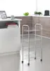 A kitchen or bathroom storage trolley is shown in a modern kitchen setting. Produktbild-Vorschau