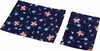 Two pieces of fabric with a floral and butterfly pattern are laid out on a white background. Produktbild-Vorschau