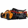 A rear-view of an orange and black toy car model. Anteprima dell’immagine prodotto