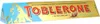 A Toblerone chocolate bar packaging with mountains and the brand name. Produktbild-Vorschau