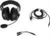 A black headset with a microphone and its accessories are displayed against a white background. Produktbild-Vorschau