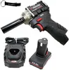 A product shot of a cordless impact wrench kit, including the tool, battery, charger, and a keychain, against a white background. Náhled obrázku produktu
