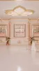 A clean, modern interior with a pink and gold color scheme, featuring toffee machines and seating areas. Voir les images du produit