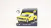 A product box for a toy car model, featuring a yellow car. Produktbild-Vorschau