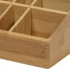 A close-up view of a bamboo organizer with multiple compartments. Náhled obrázku produktu