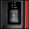 A close-up of a control panel with a switch and mode indicators for an electronic device. Produktbild-Vorschau
