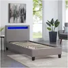 A bedroom scene with a bed, a painting, a plant, and a chair. Produktbild-Vorschau