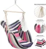 A striped hammock chair with cushions, shown hanging and with close-up details of its construction and materials. Podgląd zdjęcia produktu