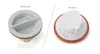 Two views of a white plastic cap with a red rubber seal, against a white background. Produktbild-Vorschau