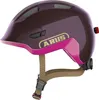 A bicycle helmet for children, shown from a side-angle on a white background. Produktbild-Vorschau