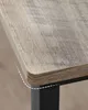 Close-up of a table corner with a wood grain texture. Náhled obrázku produktu
