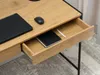 A close-up view of a wooden desk with a drawer pulled out, showing a notebook and a pen inside. Náhled obrázku produktu