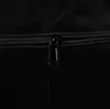 A close-up shot of a black zipper on a black fabric. Produktbild-Vorschau