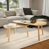 A living room scene with a sectional sofa and a nested coffee table set. Produktbild-Vorschau