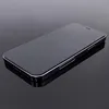 A black smartphone with a silver trim is shown on a reflective black surface. Anteprima dell’immagine prodotto