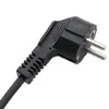 A close-up of a black electrical plug with two metal prongs. Produktbild-Vorschau