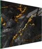 A close-up view of a black marble cutting board with gold veining. Náhľad obrázku produktu