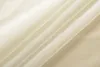 A close-up, abstract view of draped fabric, likely curtains or a similar textile, with soft lighting creating shadows and highlights. Produktbild-Vorschau