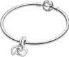 A silver Pandora bracelet with a clasp and a charm of two intertwined hearts. Podgląd zdjęcia produktu