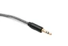 A close-up shot of a single audio cable connector with a braided cable. Podgląd zdjęcia produktu
