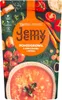 A pouch of tomato soup with chicken and rice, surrounded by fresh ingredients like tomatoes, onions, and carrots. Podgląd zdjęcia produktu