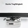 A black curtain rod and its accessories are placed on a digital scale, with text overlay indicating 'Starke Tragfähigkeit' (Strong Load Capacity). Produktbild-Vorschau