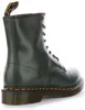 A close-up side view of a green Dr. Martens boot. Produktbild-Vorschau