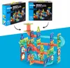 The image shows two boxes of magnetic building blocks and a constructed marble run made from the blocks. Produktbild-Vorschau