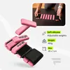 A product shot of pink ankle and wrist weights with a close-up inset showing them being used. Podgląd zdjęcia produktu