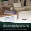 A kitchen counter with a sink and dish towels. Produktbild-Vorschau