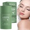 A green mask stick product is shown next to a woman with water splashing on her face. Náhled obrázku produktu