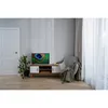 A living room scene with a TV on a stand, a chair with a blanket, a plant, and a door. Produktbild-Vorschau