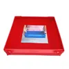 A red baking dish and frame are shown on a white background. A manual is visible inside the dish. Produktbild-Vorschau