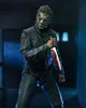 A figure of Michael Myers holding a bloody knife in a dimly lit environment. Náhled obrázku produktu