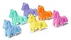 A group of colorful toy horses arranged on a white background. Podgląd zdjęcia produktu