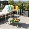 A serving cart with drinks and fruit on a patio. Produktbild-Vorschau