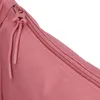 Close-up of a zipper and drawstrings on a pink bag. Anteprima dell’immagine prodotto