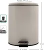 A beige pedal bin with a black lid and pedal, shown in a studio setting with measurement indicators. Anteprima dell’immagine prodotto