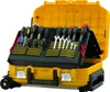 An open yellow tool case with various tools neatly organized inside. Voir les images du produit